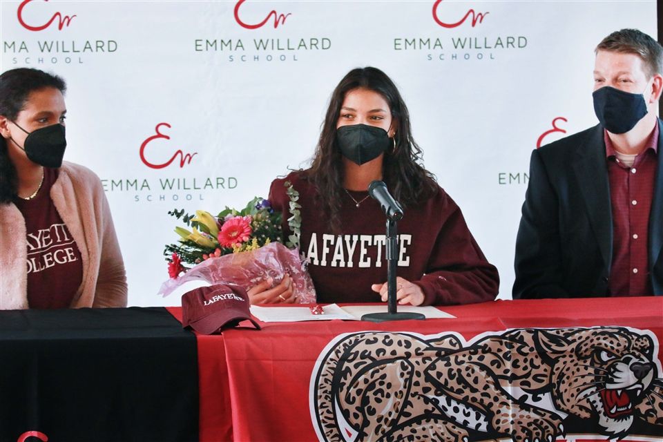 Emma S. ’22 joined by her parents on National Signing Day!