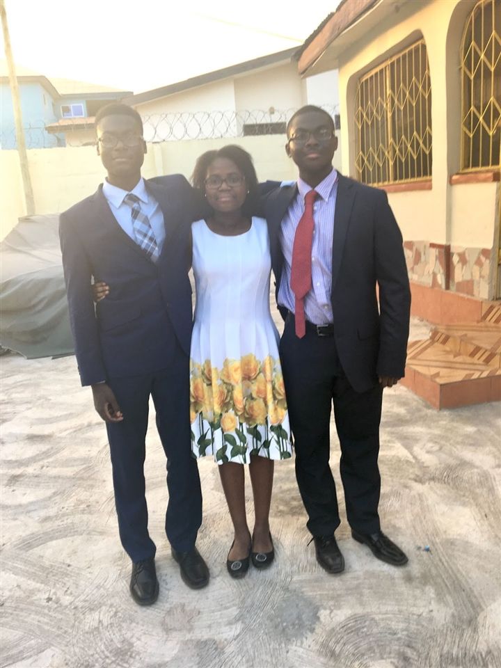 Vernette B. '24 and her brothers in Ghana