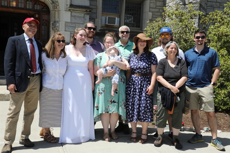 Families gathered for long-awaited photo opportunities following the ceremony